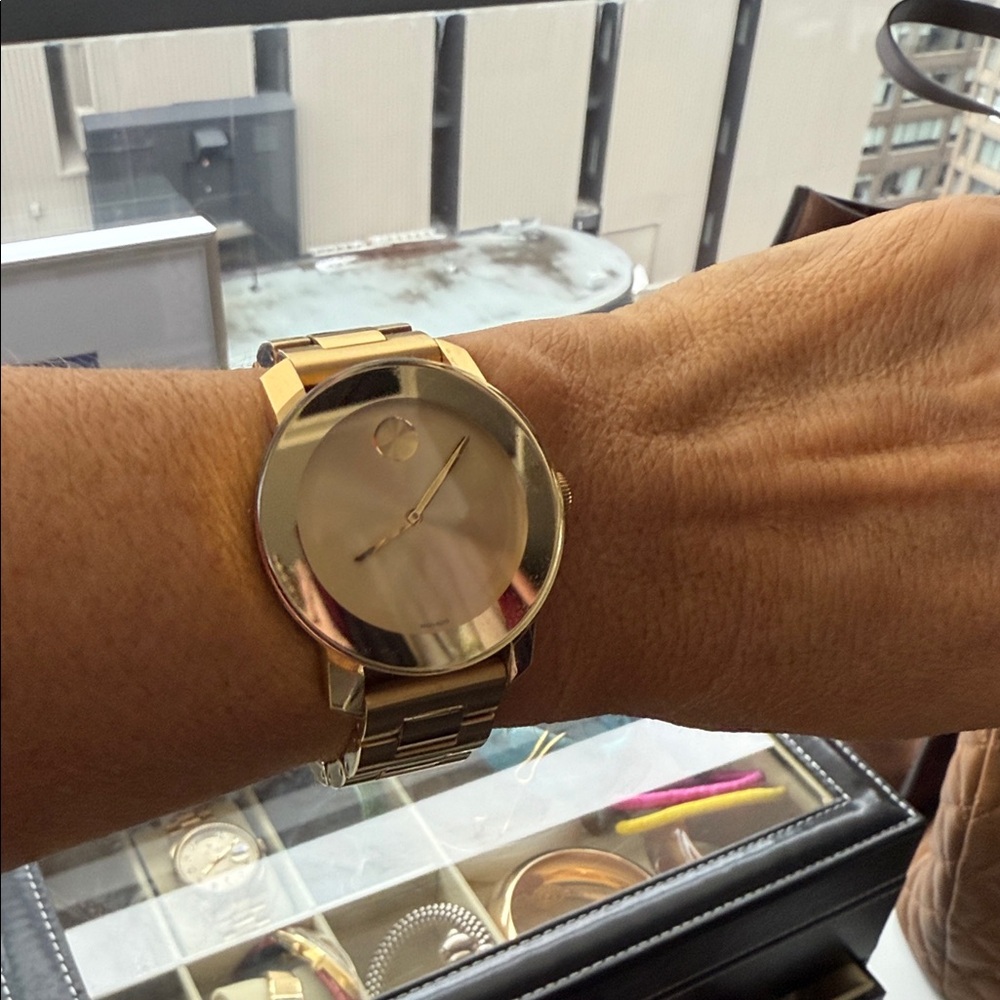 Movado Gold colour Watch with Round Face